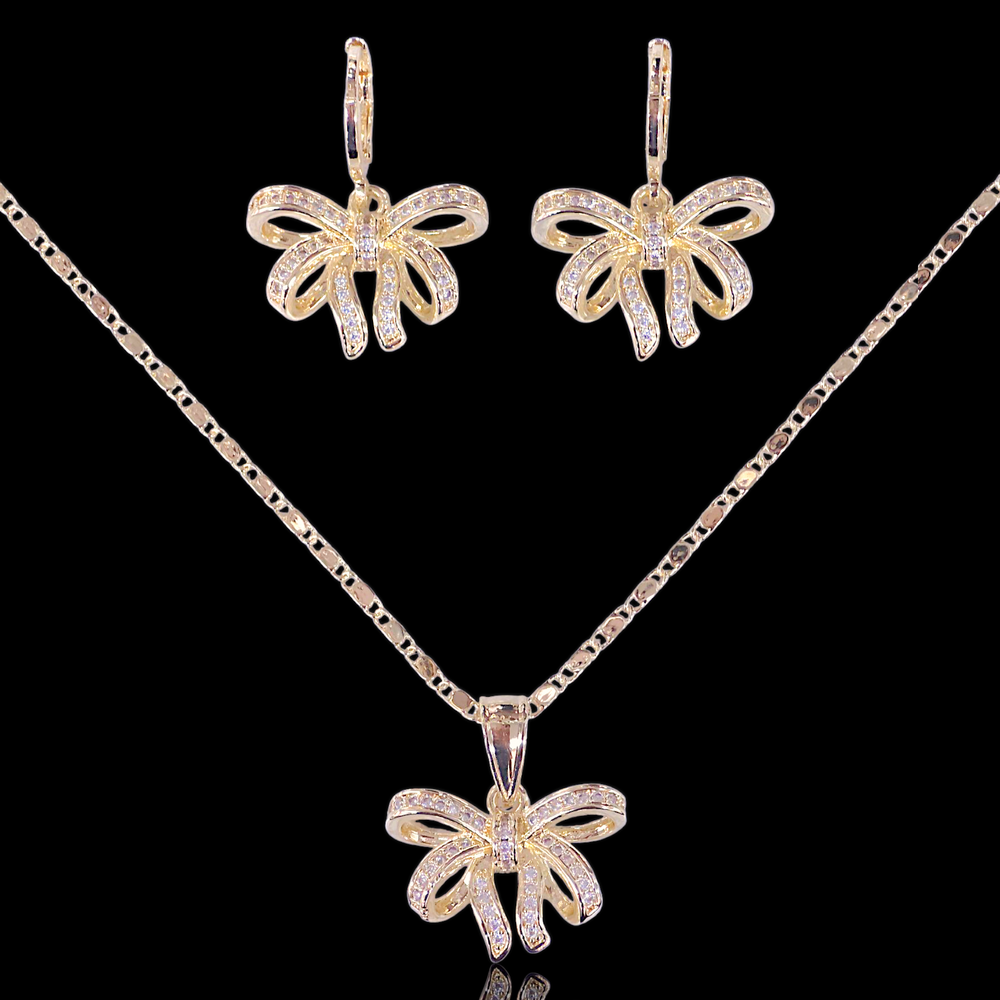 elegance and charm to your look with this stunning bow jewelry set
